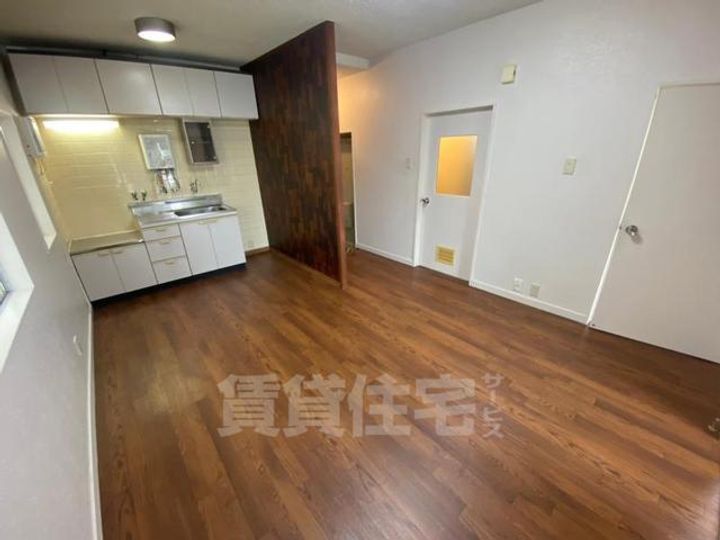 サンコーポ香里の居間