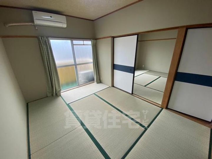 サンコーポ香里の寝室