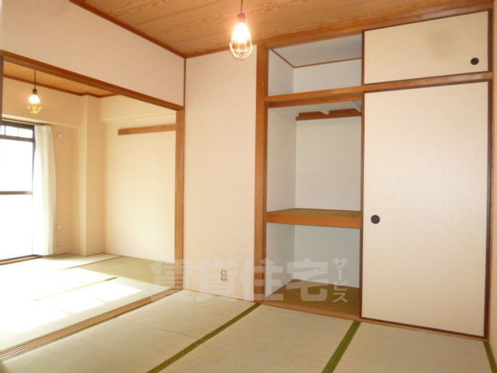 大阪府豊中市利倉西1丁目の賃貸マンションの寝室