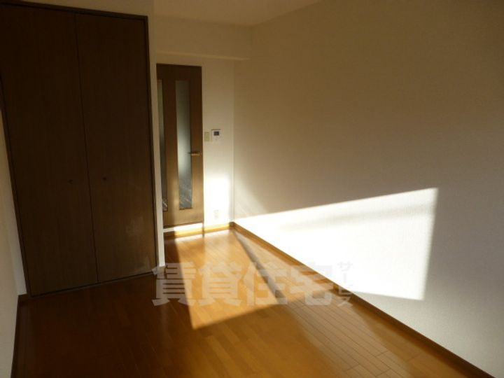大阪府堺市堺区榎元町3丁の賃貸マンションの居間