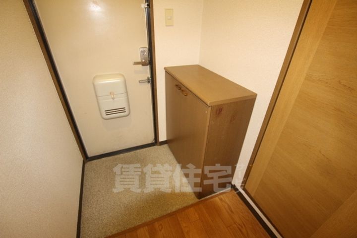 ロイヤルカーサ姫里の玄関