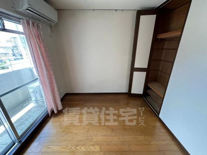 PALAZZINAエスタ蛍池の寝室