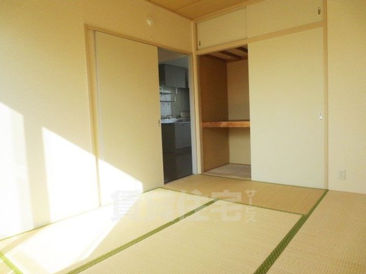 大阪府茨木市沢良宜西2丁目の賃貸アパートの居間