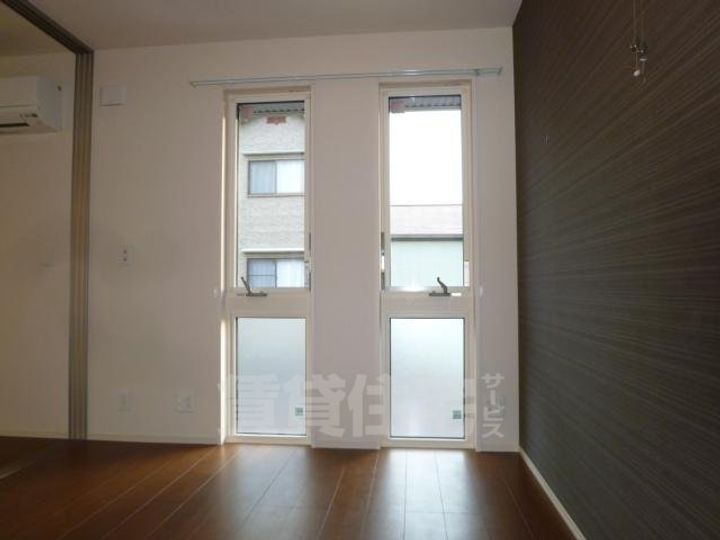 大阪府堺市堺区出島町4丁の賃貸アパートの寝室