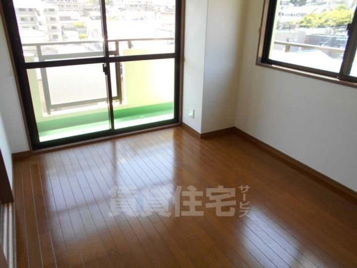 大阪府柏原市国分市場2丁目の賃貸マンションの寝室