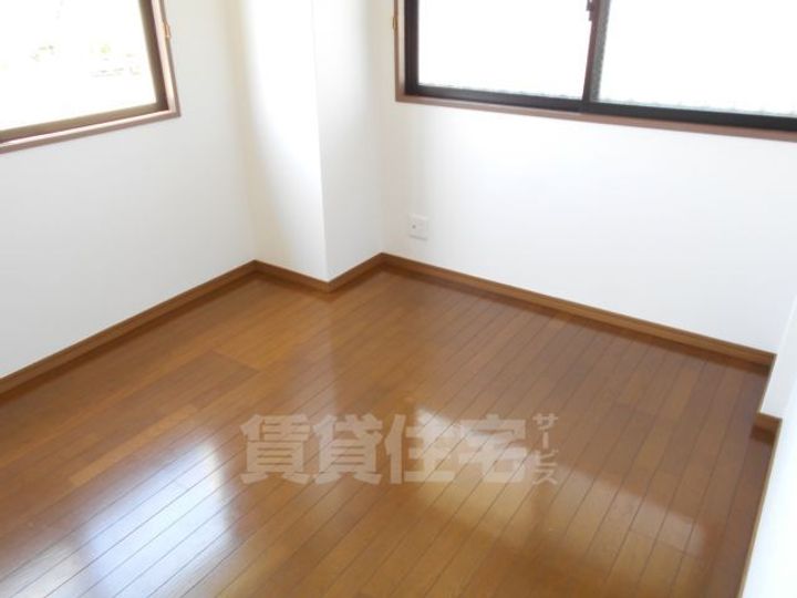 大阪府柏原市国分市場2丁目の賃貸マンションの寝室