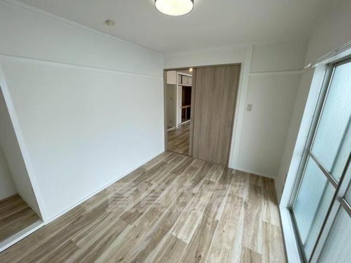 大阪府豊中市服部豊町1丁目の賃貸マンションの寝室