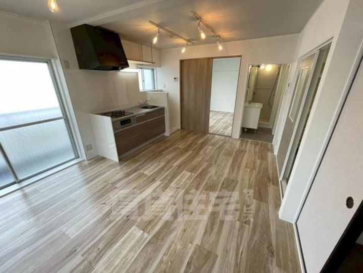 大阪府豊中市服部豊町1丁目の賃貸マンションの居間