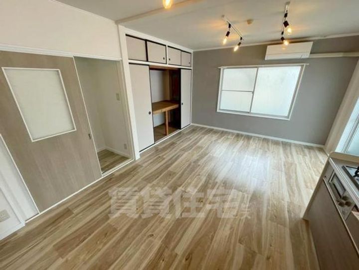 大阪府豊中市服部豊町1丁目の賃貸マンションの居間