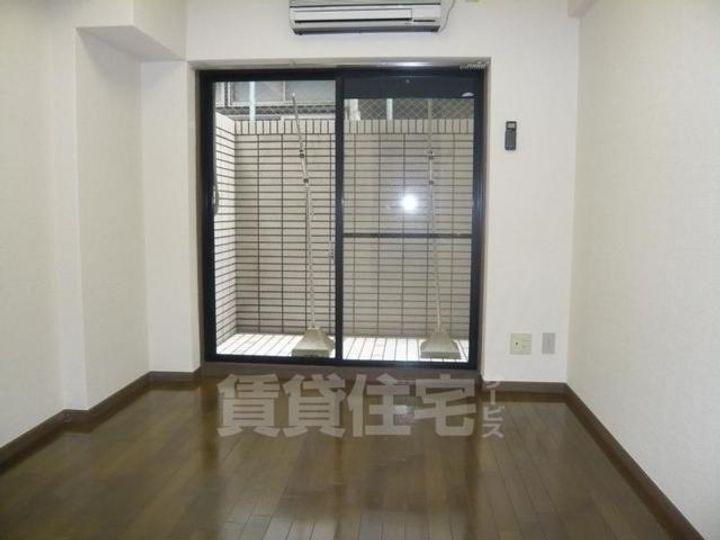 大阪府堺市堺区中向陽町1丁の賃貸マンションの居間