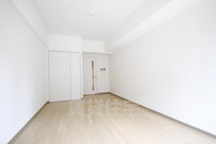 大阪府堺市堺区北花田口町2丁の賃貸マンションの居間