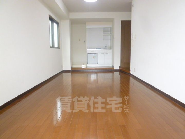 大阪府豊中市服部南町3丁目の賃貸マンションの居間