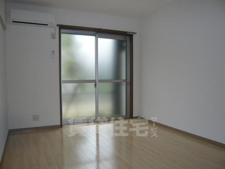 大阪府堺市西区鳳東町7丁の賃貸アパートの寝室