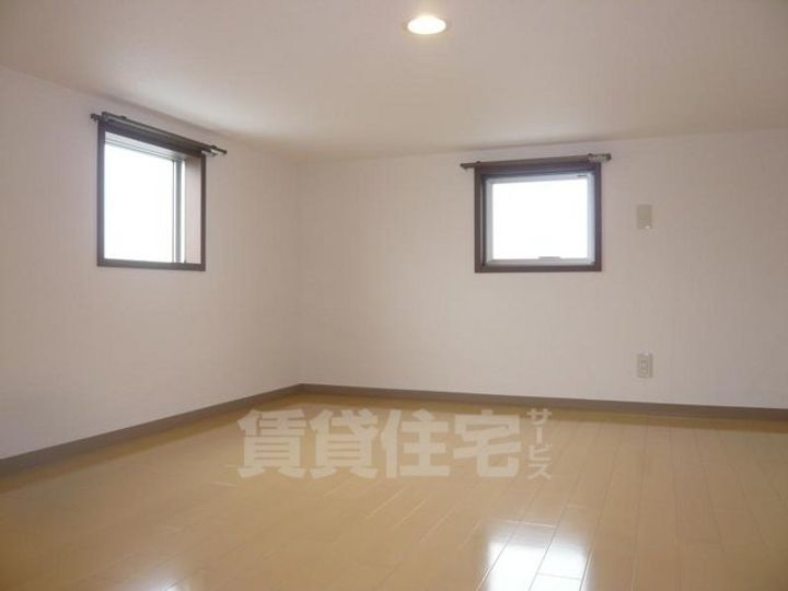 大阪府堺市西区鳳東町7丁の賃貸アパートの居間