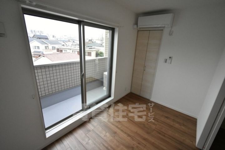 大阪府堺市北区金岡町の賃貸アパートの寝室