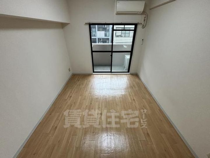 大阪府大阪市都島区都島北通2丁目の賃貸マンションの居間