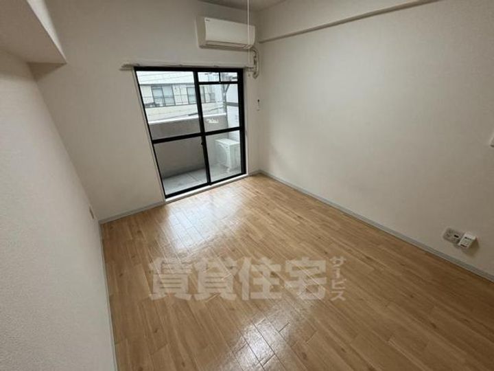 大阪府大阪市都島区都島北通2丁目の賃貸マンションの居間