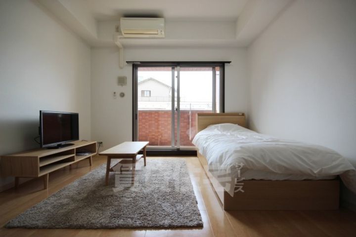 大阪府大阪市都島区都島本通3丁目の賃貸マンションの居間