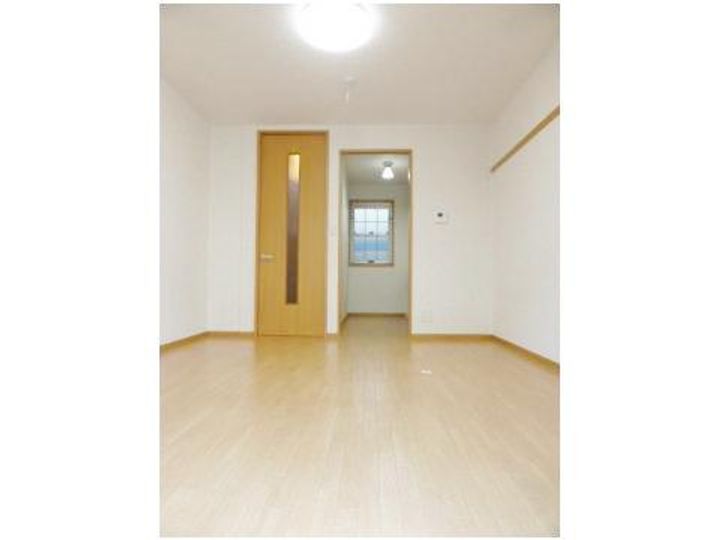 プランドール彩の居間