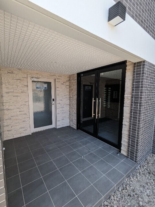 Maison Kamuy 本郷通  の玄関