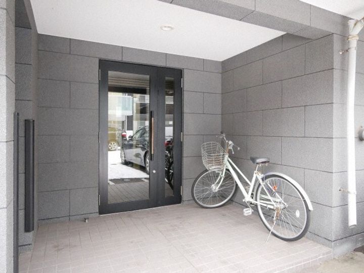 コスモ麻生の玄関