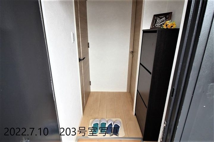 ヴィレッタ松山町103の玄関