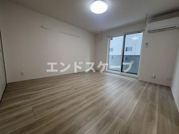 AKコンフォルト高崎栄町203の居間