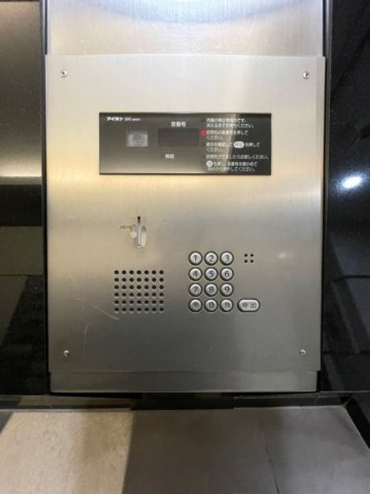 プレシャスコート金山604の玄関