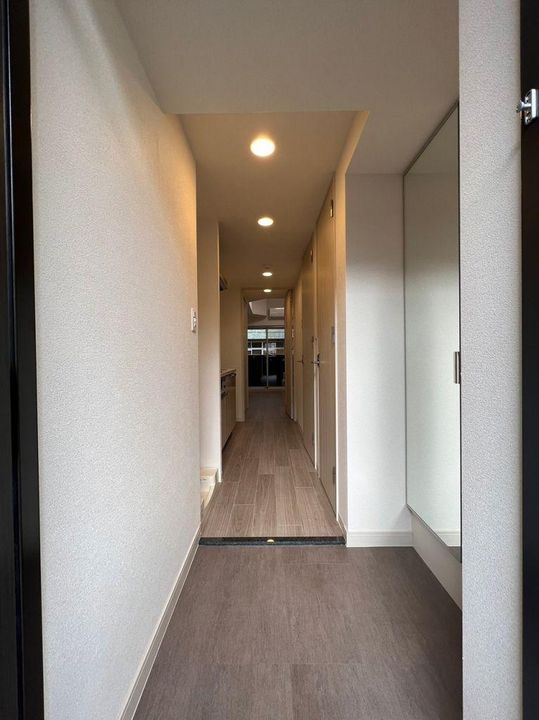 プレサンス伏見アーバンベースの玄関