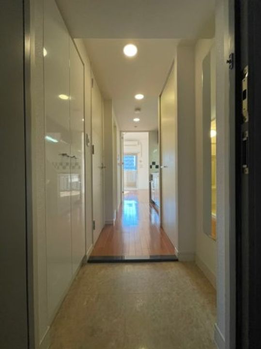 プレサンス泉セントマークの玄関