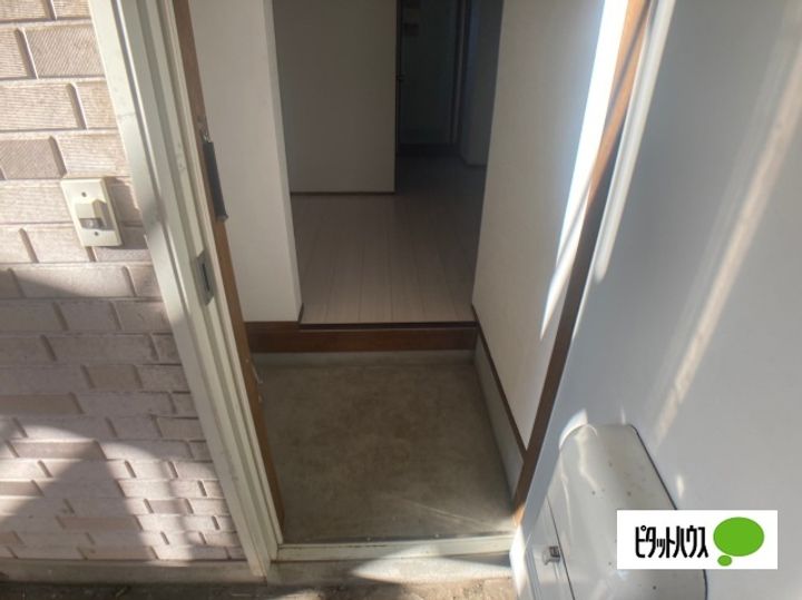 エスティーコーポ105の玄関