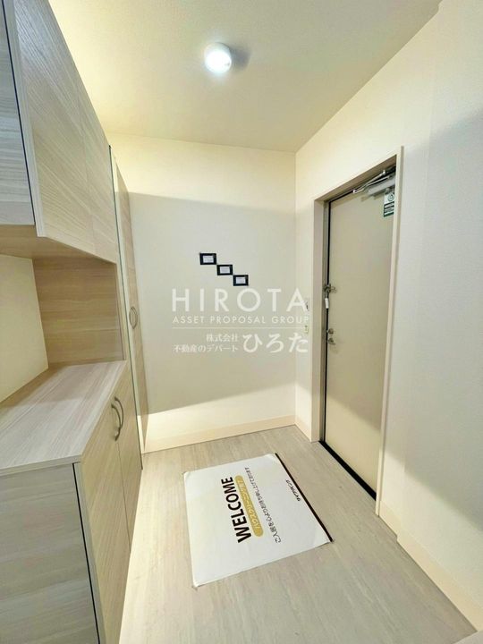 D-ROOM八幡駅前の玄関