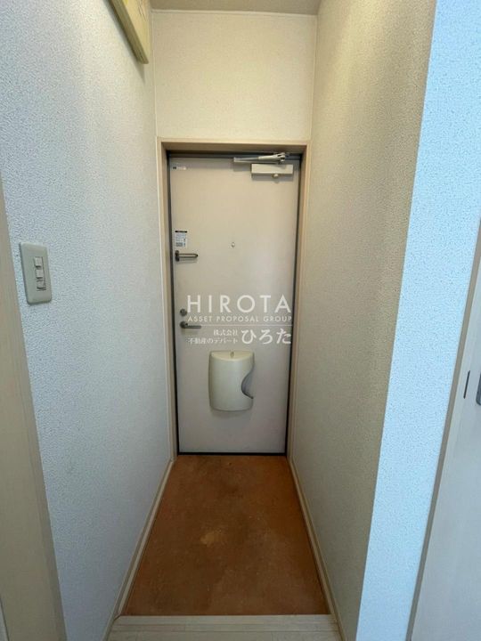 MOON朝日ヶ丘 A棟の玄関