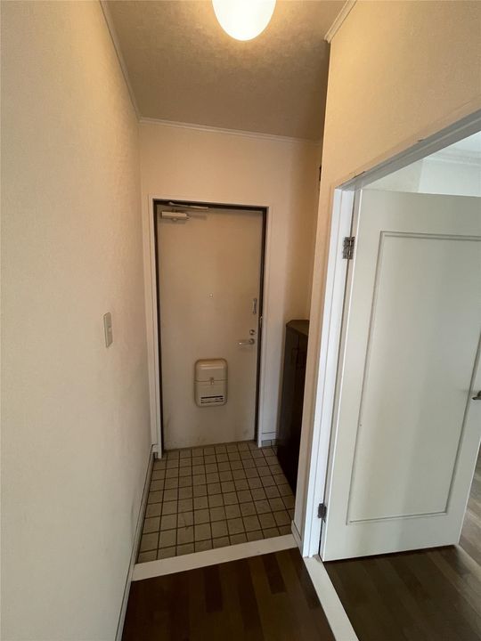 サンコスモス京良城の玄関