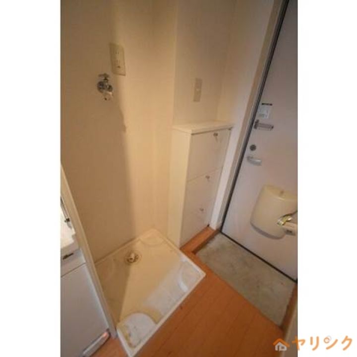 モア・グレース201の玄関