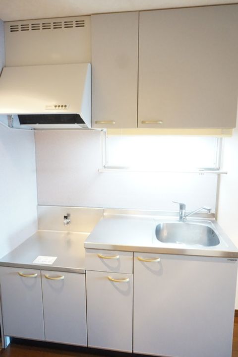 宮城県仙台市泉区市名坂字町の賃貸マンション206のキッチン