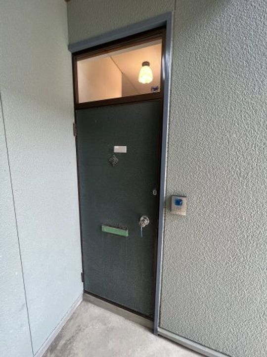 レーベ柿崎103の玄関