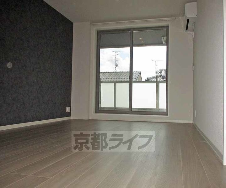 京都府宇治市五ケ庄寺界道の賃貸マンションの居間
