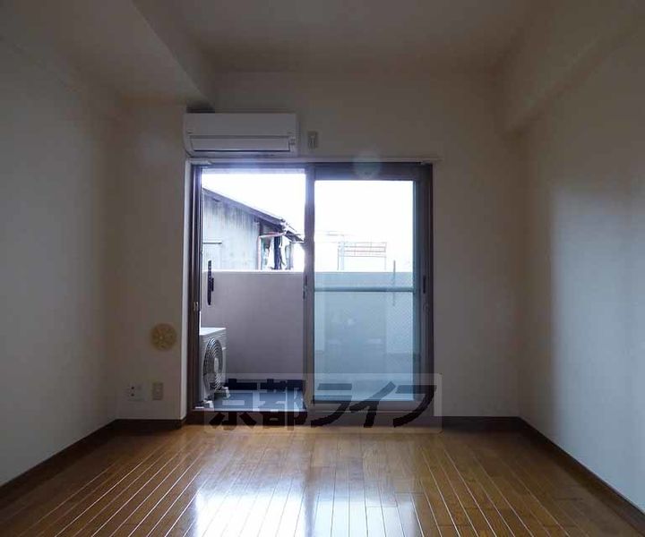 京都府京都市下京区松原通室町東入ル玉津島町の賃貸マンションの居間