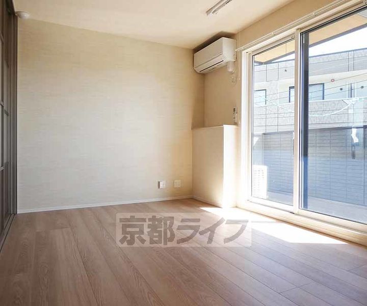 京都府京都市伏見区桃山町大島の賃貸アパートの居間