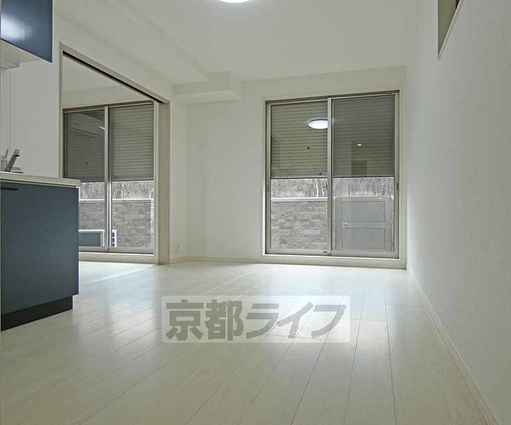 京都府京都市北区等持院南町の賃貸アパートの居間