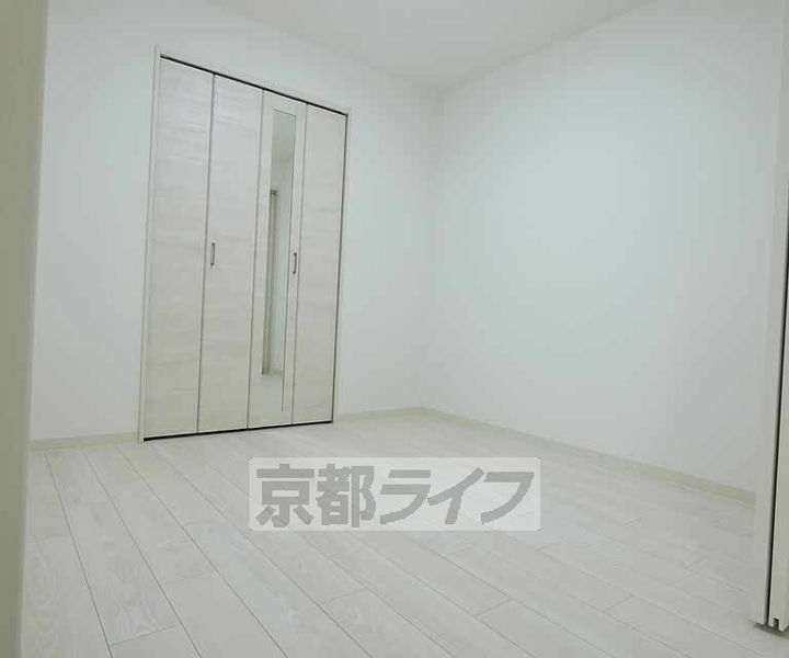 京都府京都市伏見区桃山町泰長老の賃貸アパートの居間