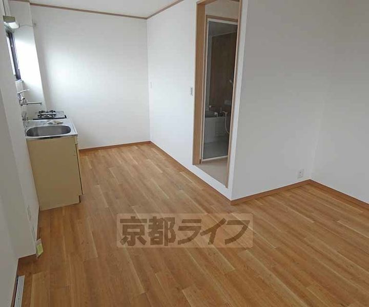 京都府京都市伏見区墨染町の賃貸マンションの居間