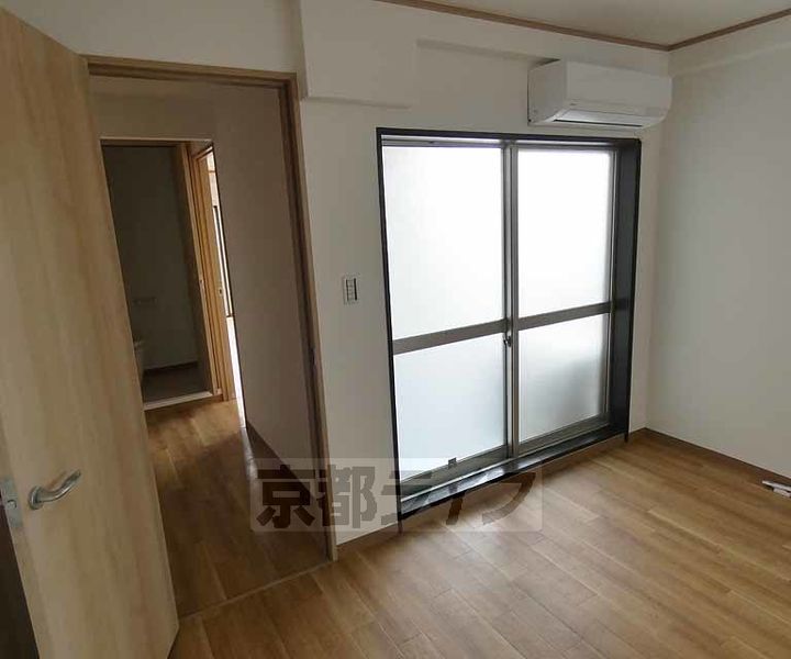 京都府京都市伏見区墨染町の賃貸マンションの居間