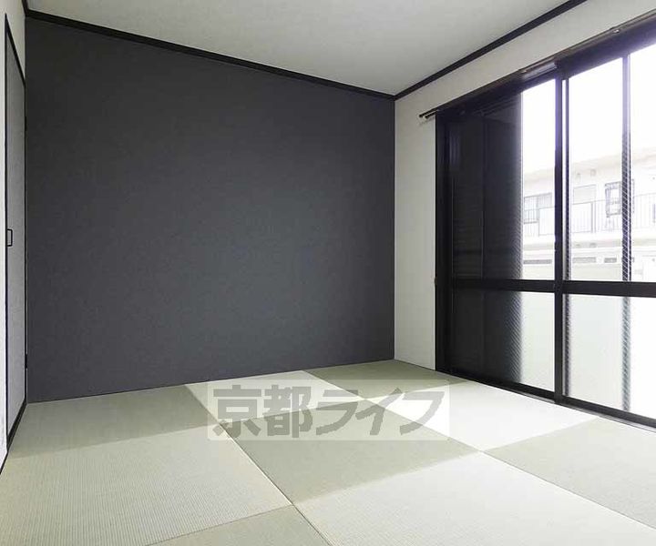 メゾン大淀202の居間