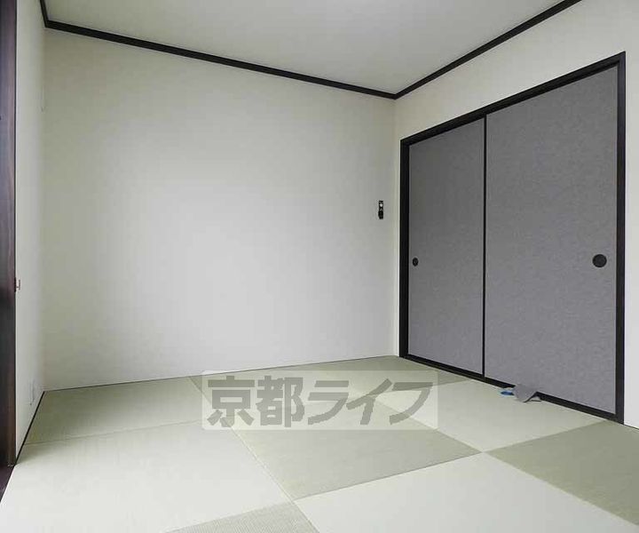 メゾン大淀202の居間