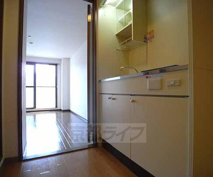 京都府京都市伏見区竹田段川原町の賃貸マンションの居間