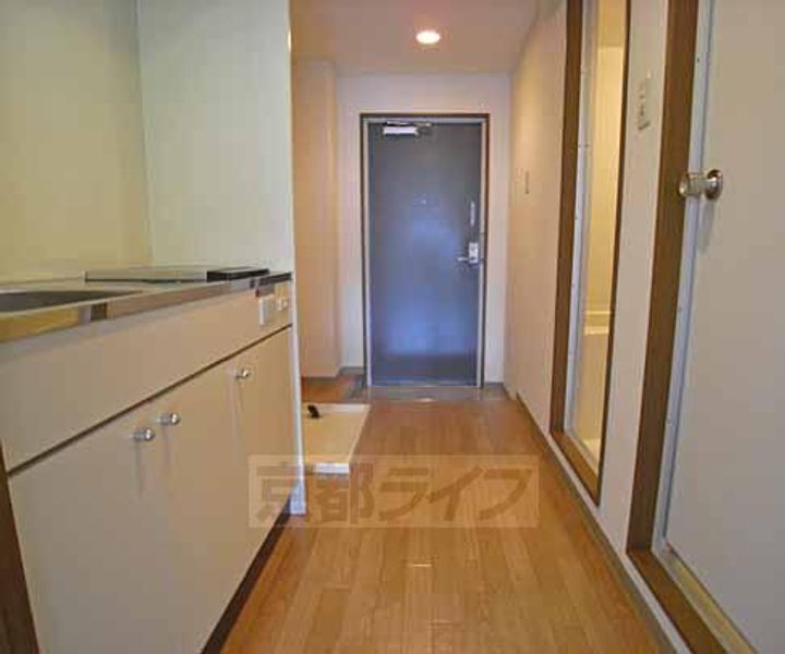 京都府京都市伏見区竹田段川原町の賃貸マンションの居間