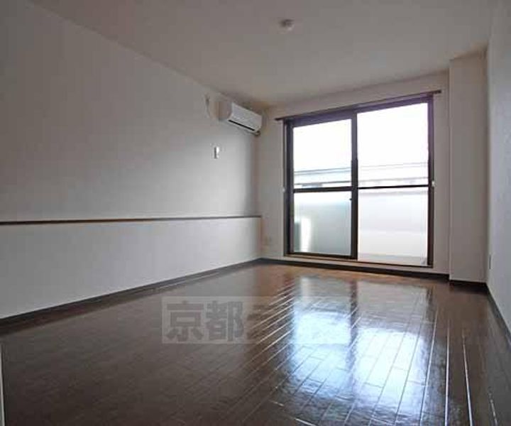 京都府京都市伏見区竹田段川原町の賃貸マンションの居間