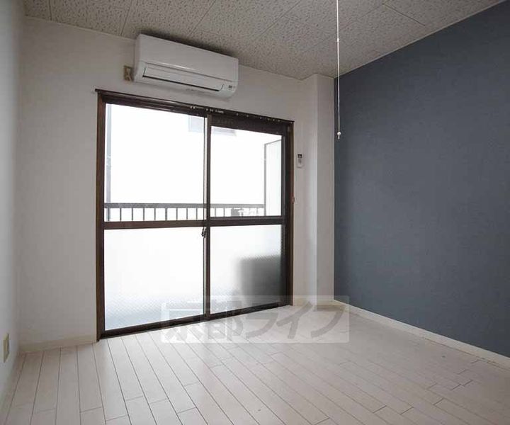 京都府京都市伏見区新町1丁目の賃貸マンションの居間